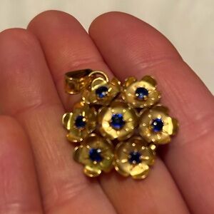 Gold Floral Pendant with Blue Accents